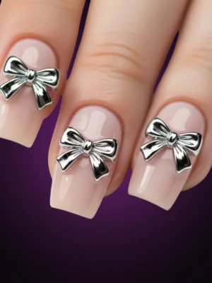 Chrome Silver Bows on Soft Beige Nails