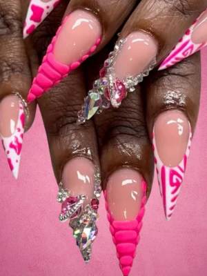 Diamond-studded pink stiletto nails