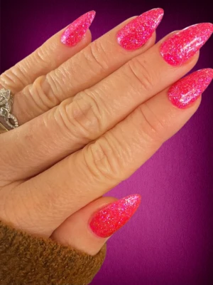 Hot pink sparkly nails