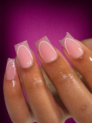 Pink glitter nails with a clear base