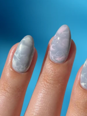 Soft Blue Nails with Winter Cloud Designs