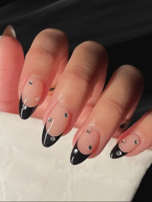 Black French Tip Nails with Rhinestone Detailing