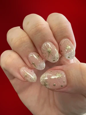 Gold Star Nail Art for Holiday Glam