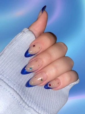 Rhinestone Accents on Blue Nails