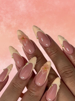  Sculpted Floral Peach Nails