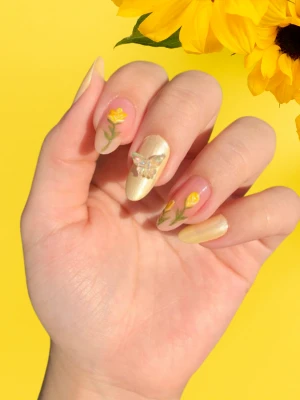 Chic Butter Yellow Nails with Modern Flair