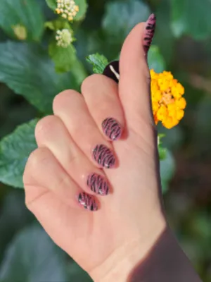 Black and Pink Zebra Nails with Glitter Accents