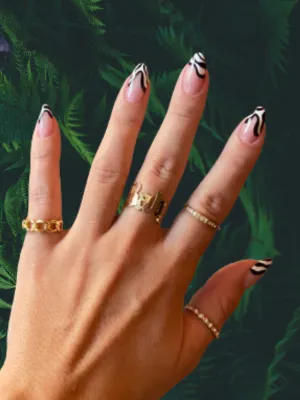 Chic French Tips with Zebra Accents