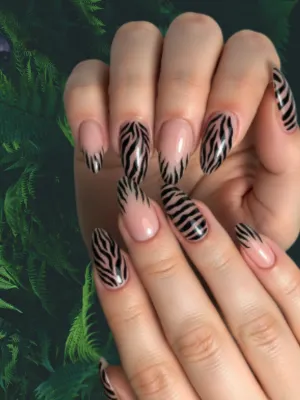 Elegant Nude Animal Print Manicure